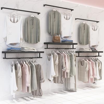 China Durable Custom Concise Clothes Store To Display Stable Wall Mounted Metal Shelf Multi Hanger for sale