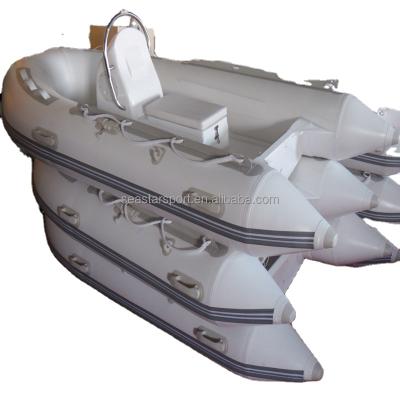 China Fiberglass and Rigid PVC China Inflatable Boat with Console Rib Boat 300 for sale