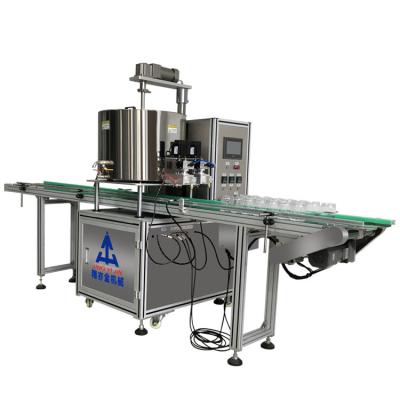 China Cream And Oil Heated Filling Machine 80L Double Head Gear Pump Heating Filling Machine for sale