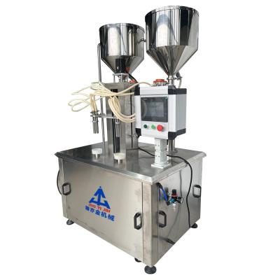 China Two-color screw hand care cream heating filling machine for sale