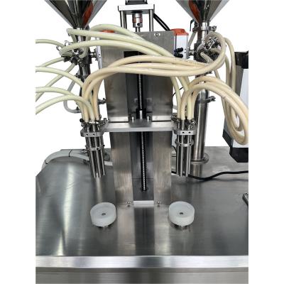 China Two-color lipbalm cream screw heating filling machine with large capacity for sale