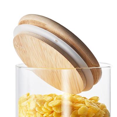 China Transparent Freshness Keeping Multi Size Round High Borosilicate Glass Jar With Bamboo Lid for sale