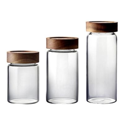 China Hot Selling Freshness Preservation Glassware Empty Food Storage Glass Jars With Spiral Fluted Bamboo Lid for sale