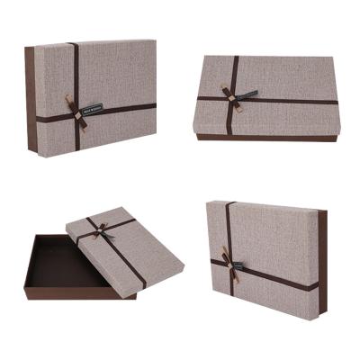 China Biodegradable Machine Made Logo Emboss Magnet Gift Foldable White Paper Cardboard Box Mailer Packaging With Magnetic Flap For Apparel for sale