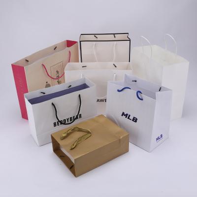 China Recyclable Custom Size Personalized Different Types Clothing Paper Bags With Satin Ribbon , Fashionable Main Branded Paper Bag Packaging for sale