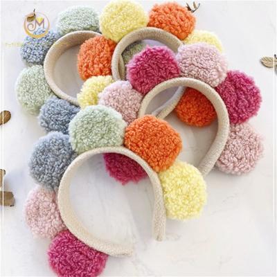 China Soft Korean Makeup Face Wash Headband Plush Flower Sun Flower Headband for sale