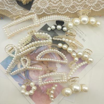 China Shark Head Clip Hair Clip Ins Simple Plastic Transparent Temperament Back Plate Pearl Hair Claws for sale