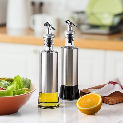 China Customizable Logo 300ml Freshness Preservation Cooking Bottle Dispenser Olive Oil And Vinegar Glass Bottle Dispenser for sale