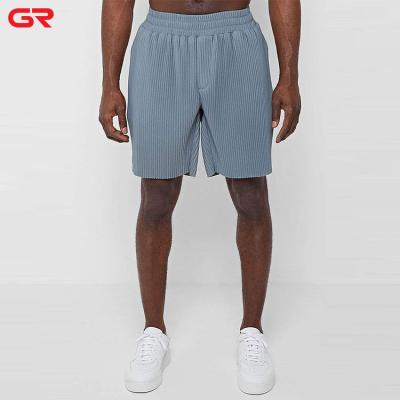 China Lightweight Anti-wrinkle Polyester Elastane Pleated Shorts Silver Eyelets Internal Drawstrings Loose Fit Pleated Shorts for sale