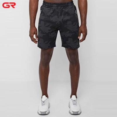 China Anti-Wrinkle New Arrival Men Zipper Pockets Fitness Gym Camouflage Shorts Reflective Branded Stripe Camouflage Print Shorts for sale