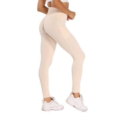 China 2022 New Breathable Wholesale Seamless Hip Yoga Pants Lifting High Waist Yoga Pants Sport Yoga Legging Pants for sale