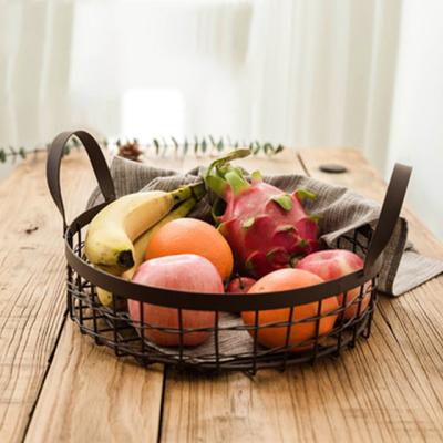 China Viable Country Style Iron Art Fruit Storage Basket With Handle Minimalist Home Decoration for sale