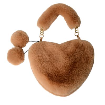 China Fashion \ comfortable chain handbag \ goods 2021 new fashion cute heart-shaped female furry plush bag love for sale