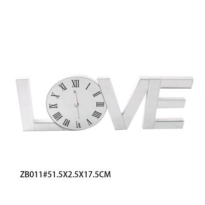 China Beautiful Artistic Mirror Glass Clock for sale