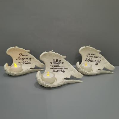 China Europe Home Decorations Resin Wing LED Candles Electronic Tea Light Candle Holder for sale