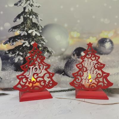 China Europe LED Christmas Decorations Red Resin Christmas Tree Candles Hollow Electronic Resin Tea Light Candle Holder for sale