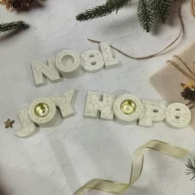 China Europe Christmas Decorations Beads Resin NOEL/JOY/HOPE Candles Resin Candle Cup for sale