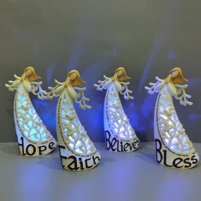 China Europe Home Decorations Polyresin Light Up Angel Figurine Scene Lighted Resin Hollow Angel for sale