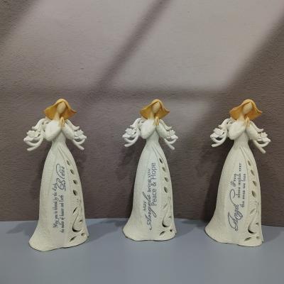 China Europe Factory Wholesale Polyresin Home Decorations Light Up Angel Figurine Lighted Resin Hollow Angel for sale