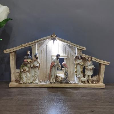 China Europe Religious Resin Christmas Figurines Light Up Nativity Resin House for sale