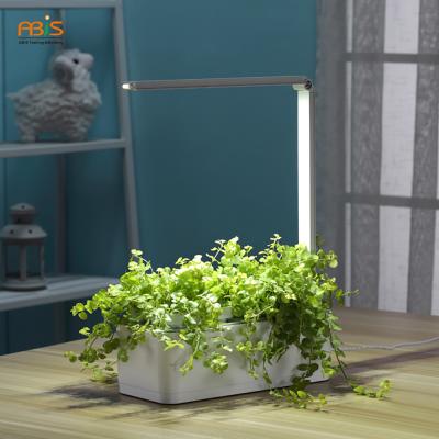 China Modern Smart Hydroponics Herb Garden Kit Indoor Mini Plant Grow System LED Lights With Self Watering Pots for sale