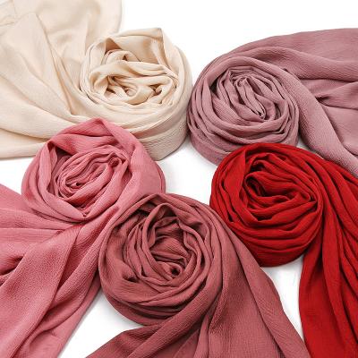 China Newest Malaysia Indonesia's Hijabs Scarf Monochrome Spot Scarf Long Natural Crinkle Silk Scarf Women's Hijabs for sale