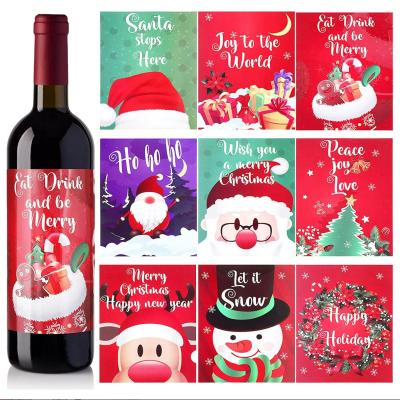 China 750ml Waterproof Cute Liquor Label Christmas And New Year Wine Bottle Holiday Party Transparent Wine Bottle for sale