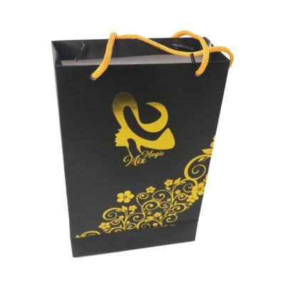 China Recycled materials custom packaging black paper bags with logo printing retail bag bolsas de papel personalizadas paper gift shopping bag for sale