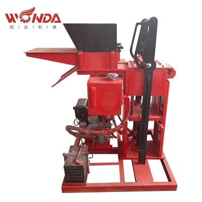 China Manual building material stores construction machinery equipment Eco brava clay mud interlock brick molding machine for sale