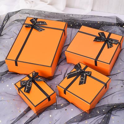 China Recycled Gift Box Orange Square Hand Materials Creative Bow Packaging For Girls To Raise Empty Birthday Paper Box for sale