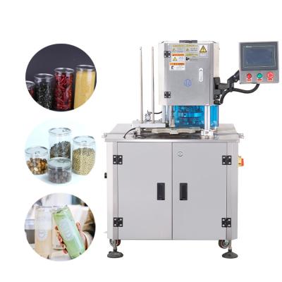 Cina Soda Can Sealer Glass Plastic  Filling And Sealing Machine Water Bottle Auto Small Carton Box Packing Machine in vendita