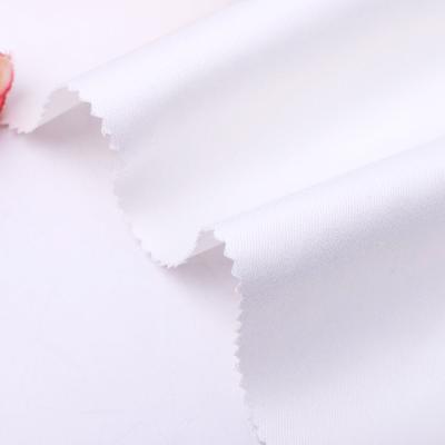 China Stain Resistant Cotton Polyester Spandex Blended Half White Stretch Twill Fabric For Garment Dyeing And Digital Printing for sale