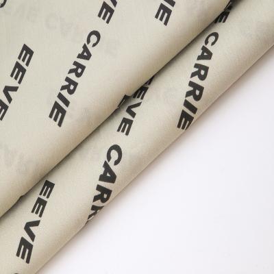 China Anti-static hot selling alphanumeric printed cotton fabric for shirts, pants for sale