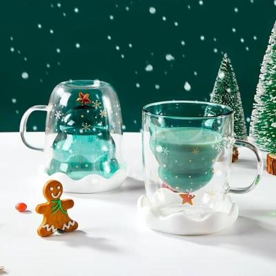 China Sustainable Christmas Holiday Tree Shaped Double Wall Glass Cup Gift Customized Christmas Cup Glass Coffee Cups for sale