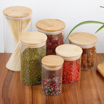 China Sustainable Transparent Kitchen Food Storage Canister Clear Borosilicate Glass Jar With Wooden Lid for sale