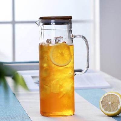 China 1200ml / 1500ml Sustainable Glass Pitcher With Lidded Lid Iced Tea Pitcher Water Jug for sale