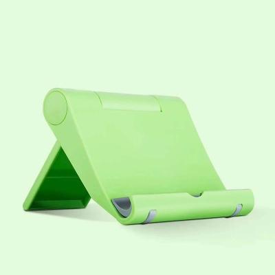 China Wholesale Adjustable Plastic Mobile Phone Holder Folding Mobile Phone Holder Table Desk Stand for sale