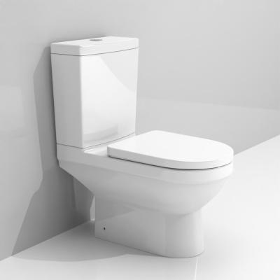 China New Flush 3/4.5L Rimless Floor Standing Toilet Flush To The Wall Two Piece High Quality Ceramic Modern Bathroom Double Flush Water Saving for sale