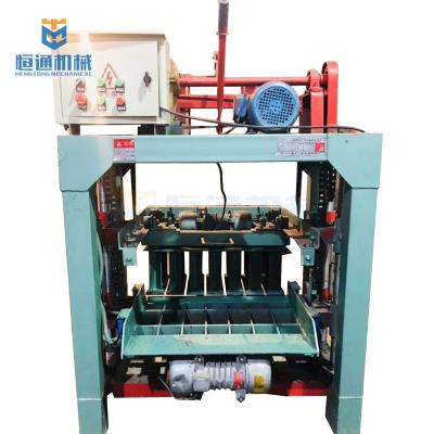 China Hydraulic Press Interlock Hollow Block Making Machine Hydraulic Pressure Method zu verkaufen