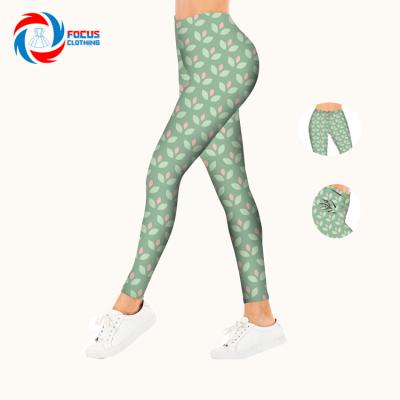 China Good Quality Breathable Custom Beanie Logo Tights Green Color Plus Size Pants Leaves Printing Yoga Gaiters for sale