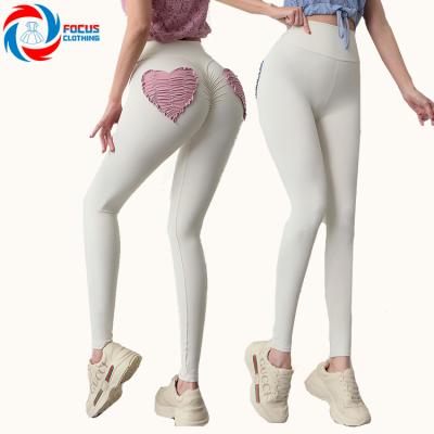 China New Love Pocket Breathable Super Elastic Bare Hip Peach Tight Pants Plus Size Women's Yoga Gaiters Pants And Trousers for sale