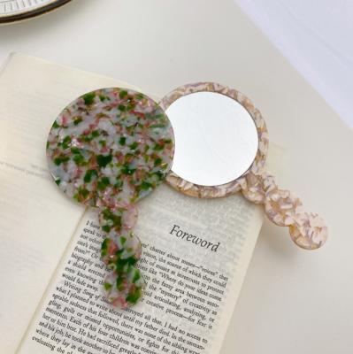 China Round Hand Mirror Multiple Color Choice Acetic Acid Mirror Custom Environmental Material For Makeup Travel Use for sale