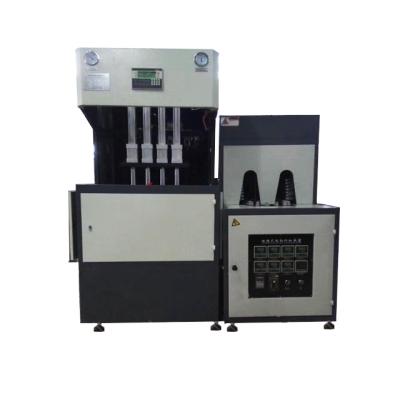 China Semi Automatic Beverage Pet Bottle Blow Molding Machine 4 Cavity for sale