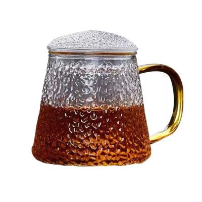 China Unbreakable Makers Hammer Pattern Tea Mug Thickened With Filter Coating High Borosilicate Glass Mug With Lid Commercial Boiling Mug for sale