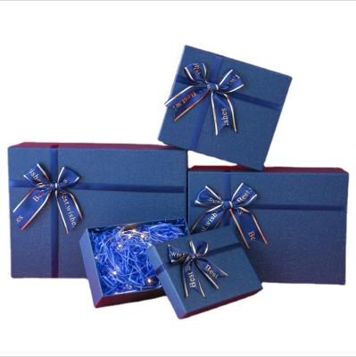 China Recyclable wholesale blue sepwerate lid box bow tie gift box cosmetics and perfume packing box for sale