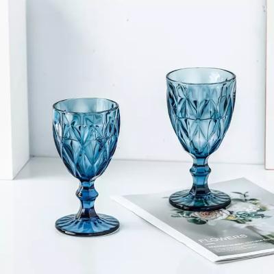 China Wholesale new classic/postmodern glassware colored goblet wine glasses water glass pressed blue glass goblets for sale