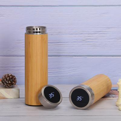 China Viable New Products 2021 Bamboo Travel Water Bottle Thermos With Temperature Display And Tea Dyer for sale