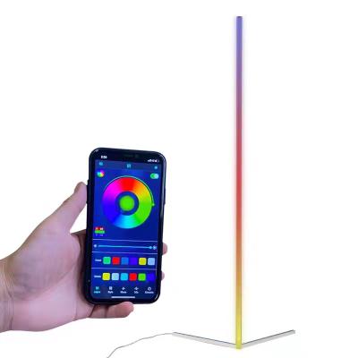 China Modern Led Floor Living Room Night Light Rainbow Sunset RGB Led Lamp Tripod European Corner Floor Lamp for sale