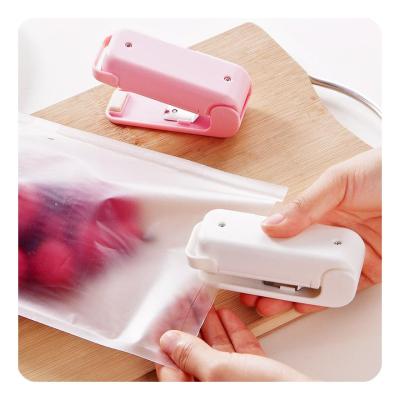 China Portable PVC Food Sealer Household Mini Sealing Machine Heat Bag Capper Saver Storage Bags Package HG2303 for sale