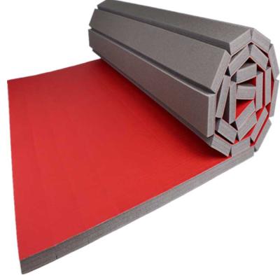 China Easy moved rolled sports Taekwondo fighting puzzle foam roll mat Muttahida Majlis-e-Amal bjj floor wrestling tatami mats for sale